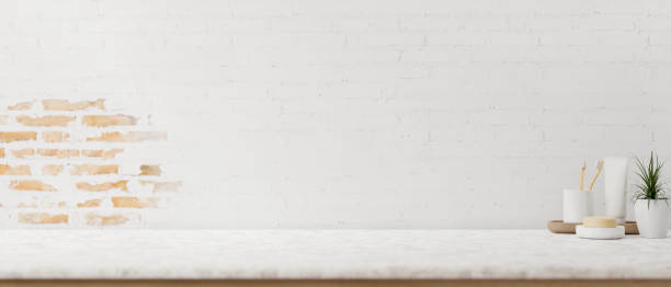 istock A minimal white tabletop with a set of toiletry against the minimal white rustic brick wall. 2152119888
