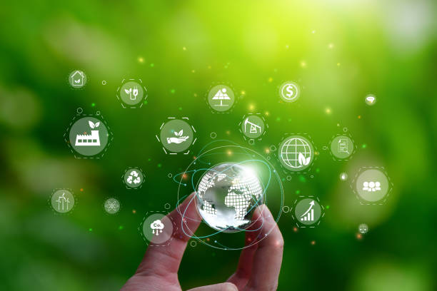 istock Glass globe in green forest with the icon environment of ESG, 2152122846