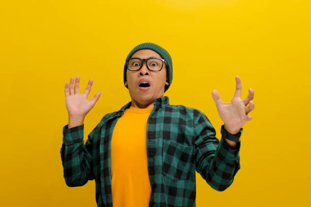 istock Thrilled Man Reacts with Surprise 2152127739