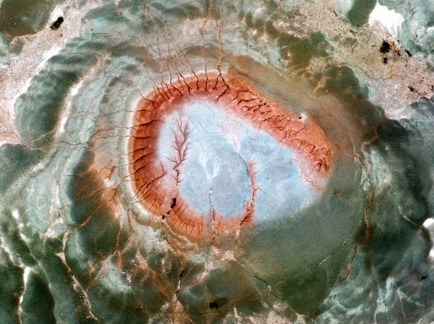 NALLIAN - colorful abstract photographs of mountains and earthen structures\n\nThese photographs taken with a drone reveal the unique colors and landforms of nature. In these images, which are one of the best examples of abstract photography, we encounter thousands of shades of green, the vastness of blue, the fire of red, the naivety of pink, the purity of white and the depth of black.\n\nThe diversity offered by nature literally dances in drone photographs. The lines of dry lands, the towering silhouettes of mountains, the bends of rivers and the reflections of lakes reflect the timeless beauty of nature. These images give us advance notice about important issues such as drought and global climate change.\n\nBackground patterns and abstract meanings add depth and meaning to photographs. These images attract viewers and stimulate their imagination, offering an emotional and aesthetic experience. For anyone who wants to discover the magic and mystery of nature, these photographs offer an inspiring journey.\n\nDiscover the power and beauty of nature with these unique drone photos! Have a unique experience by delving into the depths of nature with photographs in the background and abstract meanings. Surrender your eyes and soul to the fascinating dance of nature and discover the world from a new perspective!