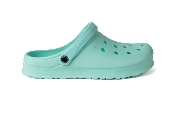 istock Right green women's rubber flip-flops insulated on a white background. 2152129149