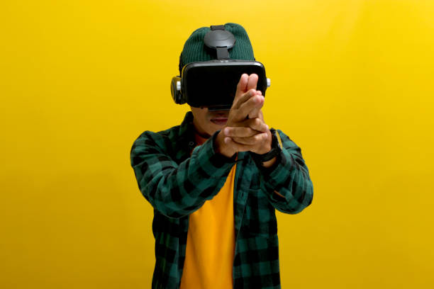 istock Asian man, wearing VR glasses on his head 2152129593