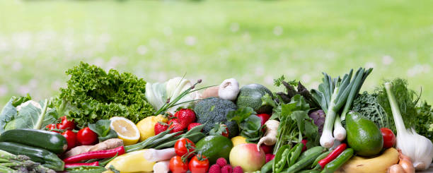 istock Wide collage of fresh vegetables and fruit with green background 2152131528