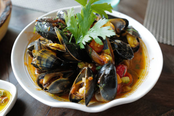 istock Close up steamed mussels pot 2152135659