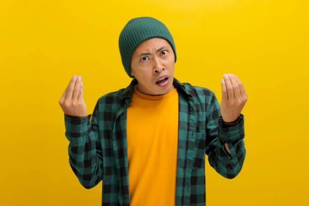 istock Young Asian man is gesturing a typical Italian hand gesture towards the camera 2152138274