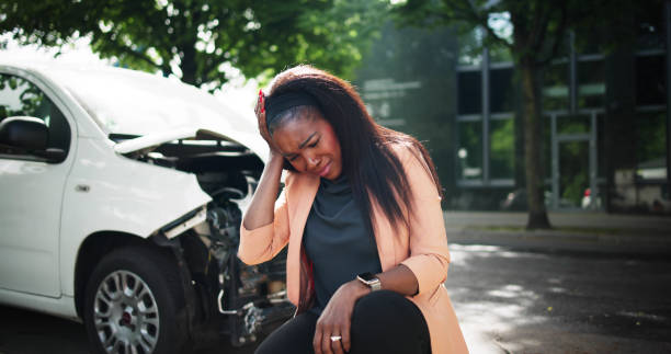 Upset Driver In Front Upset Driver In Front Of Automobile Crash Car Collision black crash stock pictures, royalty-free photos & images