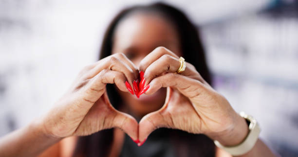 istock Woman Making Heart Sign 2152139239