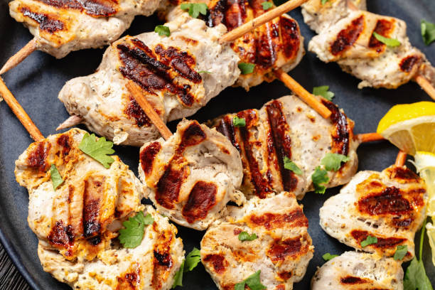 istock grilled mini pork skewers on a plate, top view 2152139819