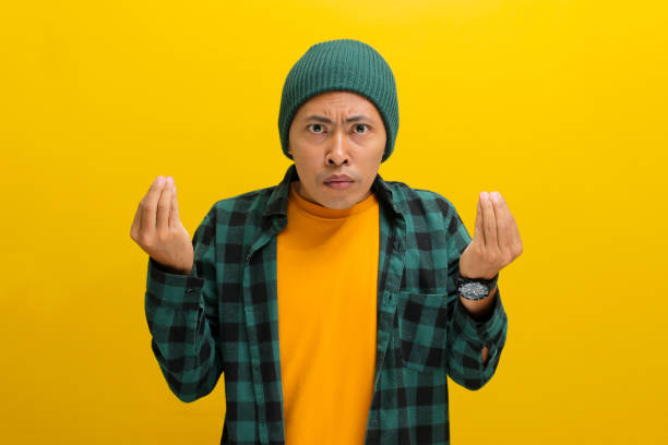 istock Young Asian man is making the Italian hand gesture with pinched fingers 2152140362