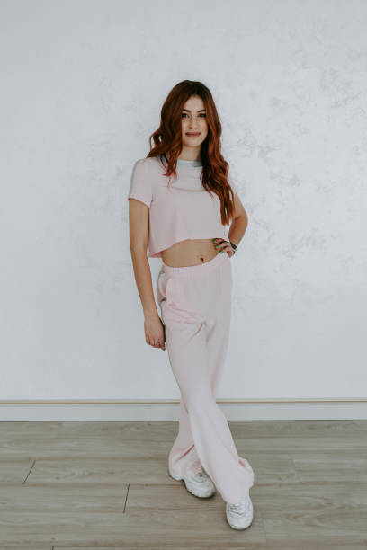 istock Girl in a completely white suit. 2152143709