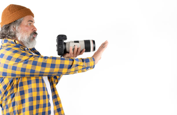 Bearded photographer gesturing to take a photo on a white or transparent background