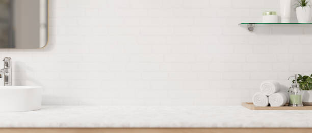 istock A modern, luxurious white bathroom countertop features a sink, a mirror, a toiletry set. 2152145039