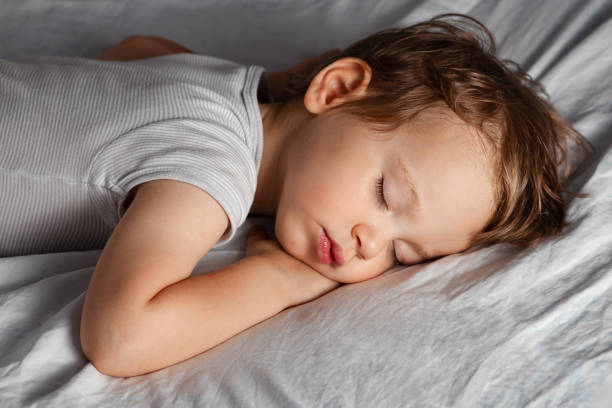 istock Cute small baby sleeping on the blanket 2152145639