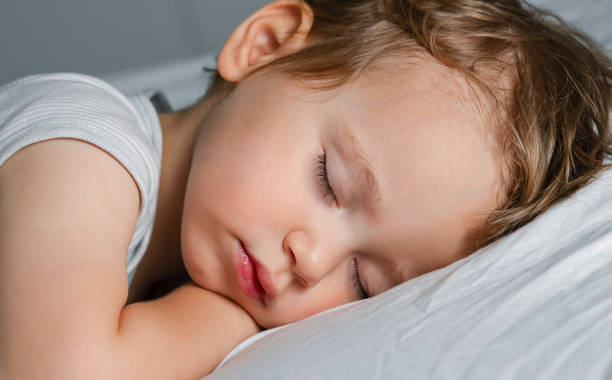 istock Cute small baby sleeping on the blanket 2152145645