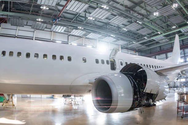 istock White passenger aircraft in the aviation hangar 2152145841