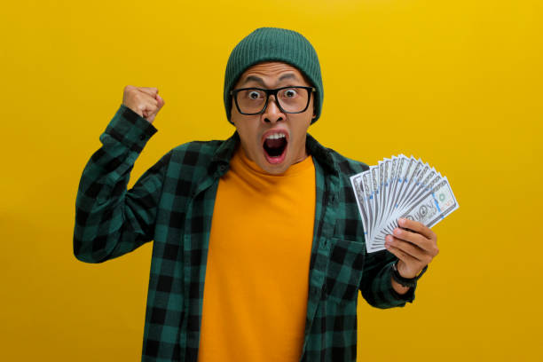istock Cash in Hand, Victory in the Air 2152146872