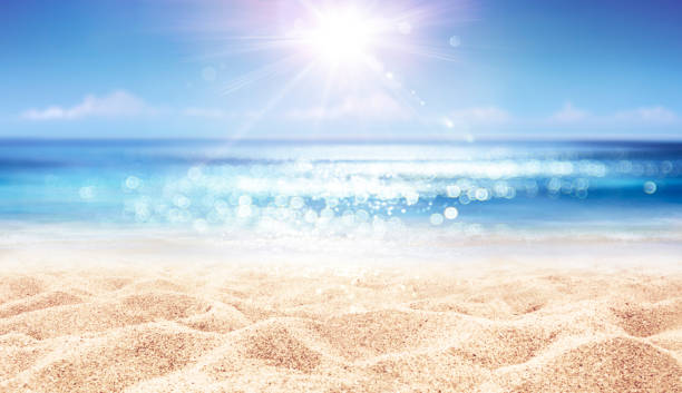 istock Beach And Sea - Summer Vacation On Sunny Sand With Glittering On Defocused Ocean 2152146987