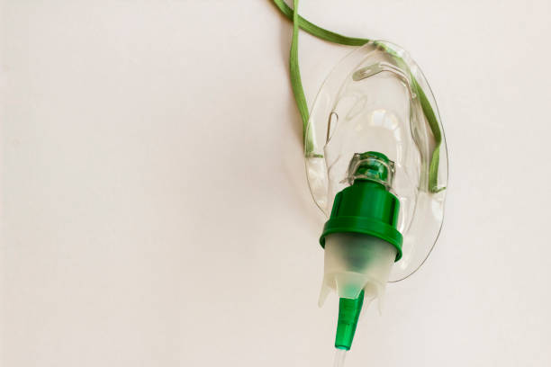 istock Green color,oxygen mask on white with copy space 2152150132