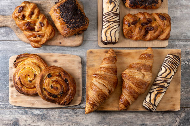 Set of bakery pastries on wooden table