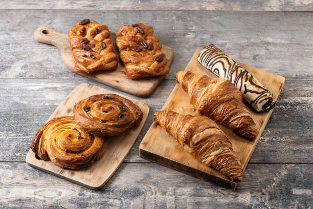 istock Set of bakery pastries on wooden table 2152151593