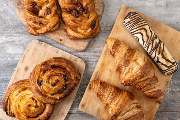 istock Set of bakery pastries on wooden table 2152151632