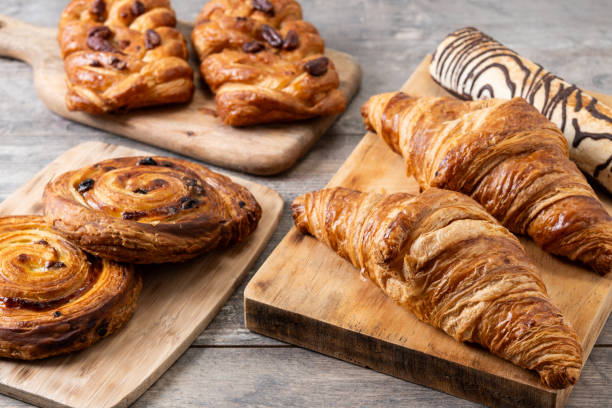 istock Set of bakery pastries on wooden table 2152151643