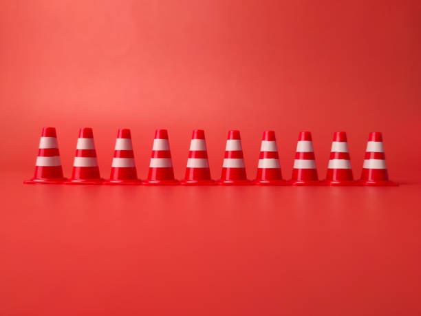 istock Traffic cones roadblock mini traffic signs arranged straight 2152153867