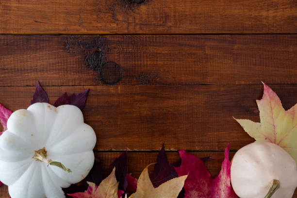 istock Autumn background whit pumpkins and leaves 2152155221