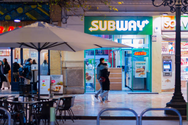 Valencia, Spain. January, 23, 2023 - Door of the Subway fast food restaurant in Valencia. night photo