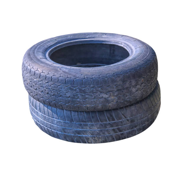 istock Two old used winter car tires isolate on a white background. 2152158964