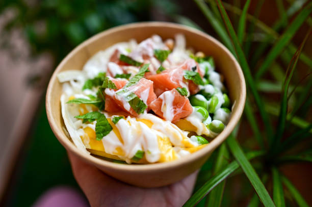 istock Poke bowl with salmon and mango close up. 2152161395