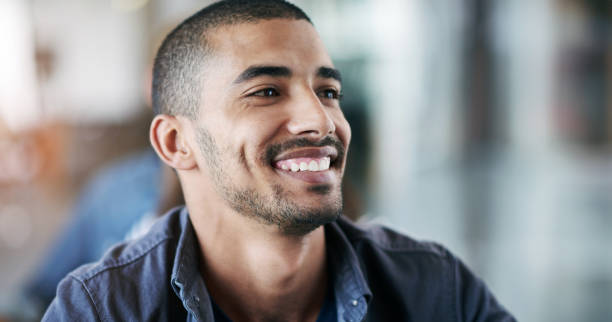 istock Business, smile and happy man thinking in office with memory, reflection or positive attitude. Face, idea or male entrepreneur with vision, dream or planning, goal or inspiration at company startup 2152162538