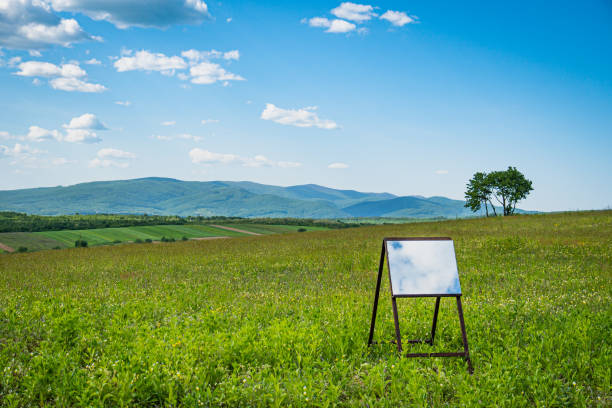 istock Spring landscape of the Carpathian mountains with a mirror on an easel 2152163043