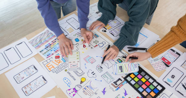 istock Application development team Brainstorming meeting and discussion to plan the design of ux ui and develop the system of applications on smartphones 2152166173