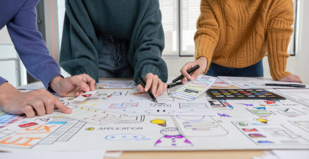 istock Application development team Brainstorming meeting and discussion to plan the design of ux ui and develop the system of applications on smartphones 2152166192