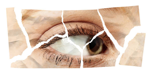 istock Photo of woman's eye torn into fragments 2152166728