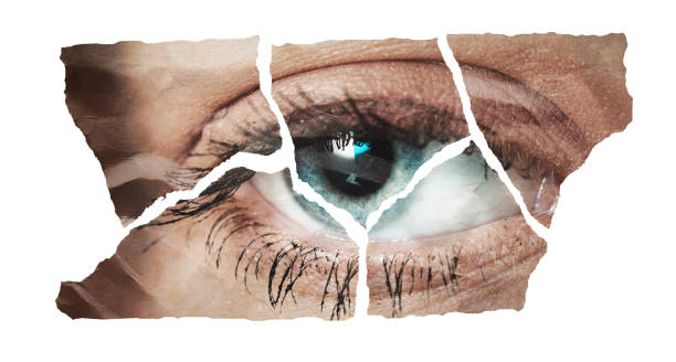 istock Photo of woman's eye torn into fragments 2152166748