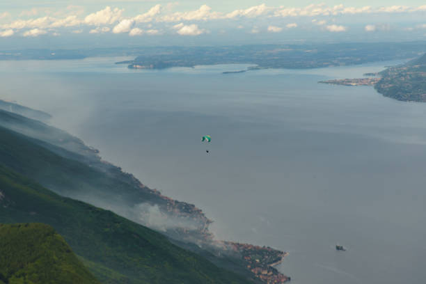 istock View on Lake Garda and the surrounding mountains, partly covered in snow 2152167659