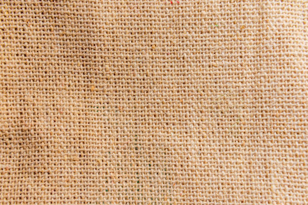 brown sackcloth texture background, crumpled burlap fabric textile for design