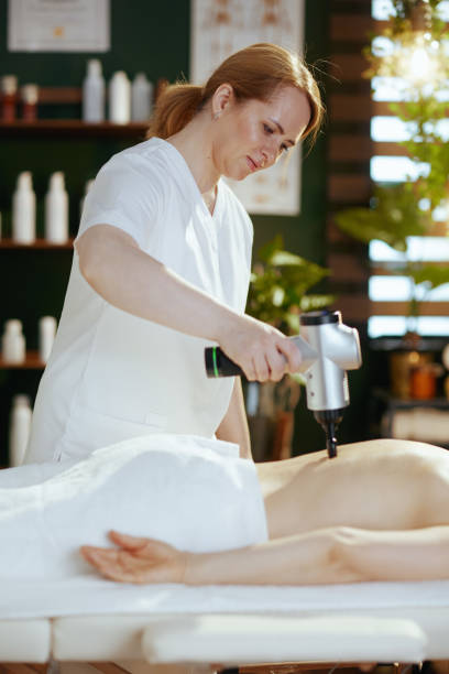 istock massage therapist in massage cabinet do therapeutic massage 2152170128