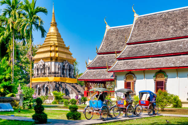 Wat Chiang Man Rickshaws in Wat Chiang Man, Chiang Mai, Thailand chiang mai province stock pictures, royalty-free photos & images