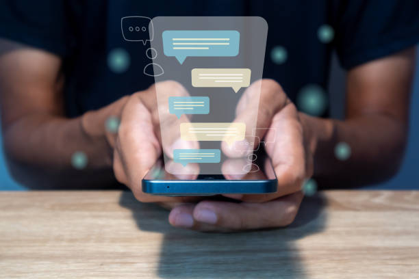 istock A  man types a message on a smart phone. Chatting, communication, dialog, conversation, and virtual relationship concept. 2152171627
