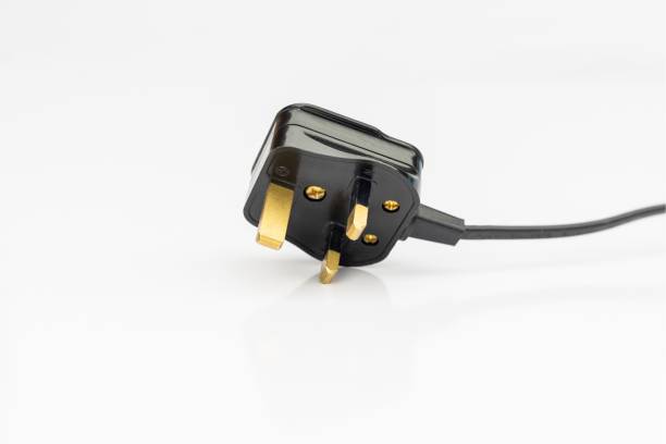 UK standard AC line plug isolated on white background