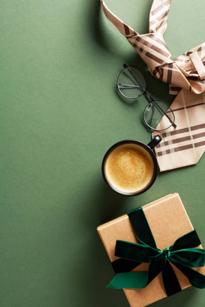 istock Happy Fathers Day concept. Flat lay gift box, necktie, glasses, coffee cup on dark green background. 2152174543