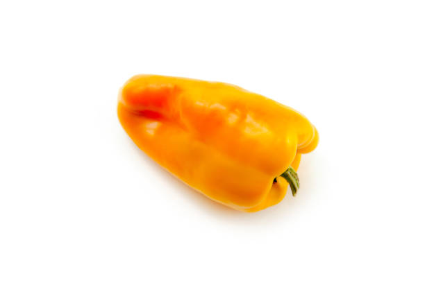 Whole yellow bell pepper (capsicum) known as sweet bell pepper, paprika isolated on white background with clipping path.