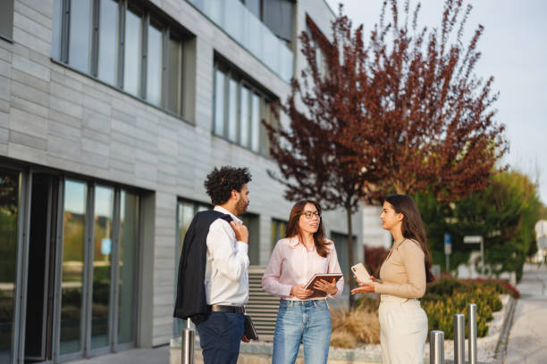 istock Diverse Business Team Engaging in Discussion Outdoors 2152179063
