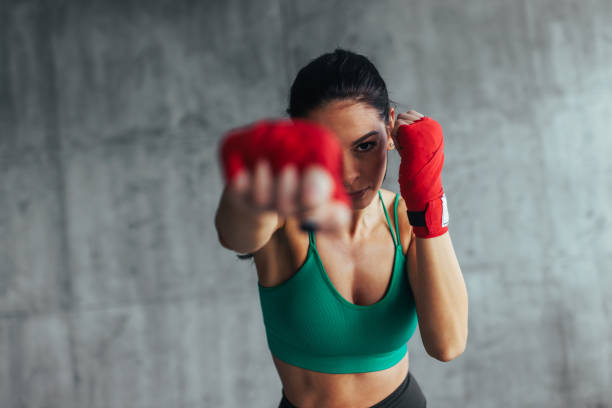 Martial artist exercising in a gym.