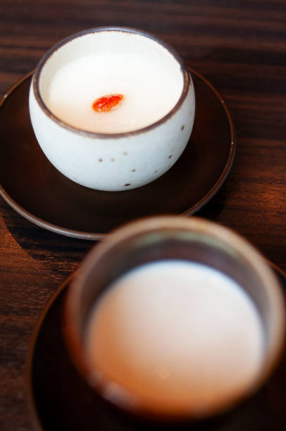 Japanese Milk Pudding in a bowl on a plate. Dark background.