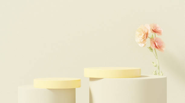 istock 3D product display scene accented with ornamental flowers against a vibrant yellow backdrop 2152191395