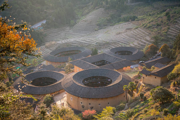 istock Aerial view of Tianluokeng Tulou cluster with evening mist. 2152192548